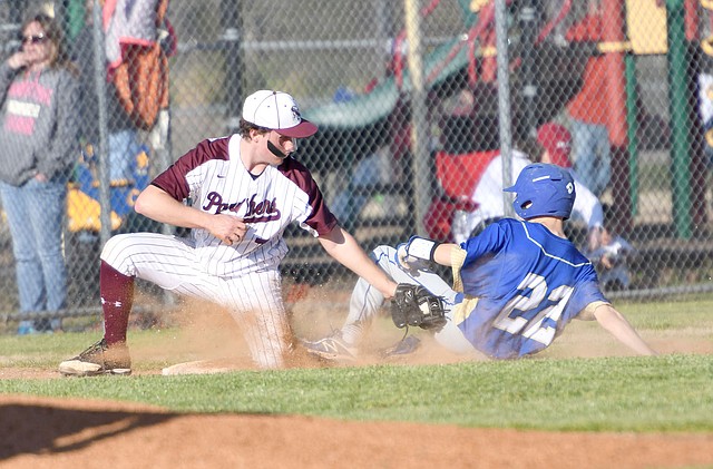 Bud Sullins/Special to Siloam Sunday Siloam Springs third baseman Jacob Rowe applies the tag to Harrison base runner Noah Moix during Tuesday's game at James Butts Baseball Complex. Harrison defeated Siloam Springs 17-2.
