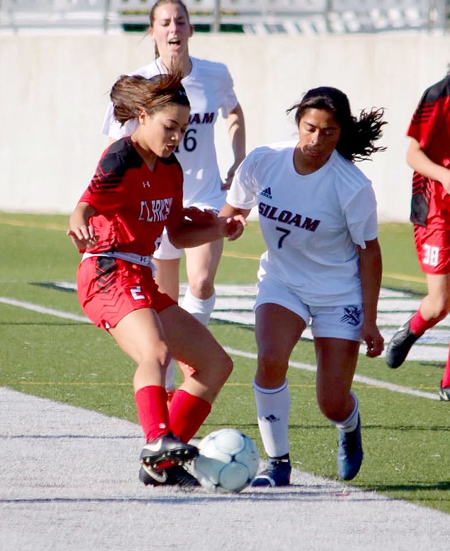 Brian Buckminster/Special to Siloam Sunday Laura Morales, right, scored a hat trick of three goals during Siloam Springs' 10-0 win over Clarksville on Tuesday at Panther Stadium.