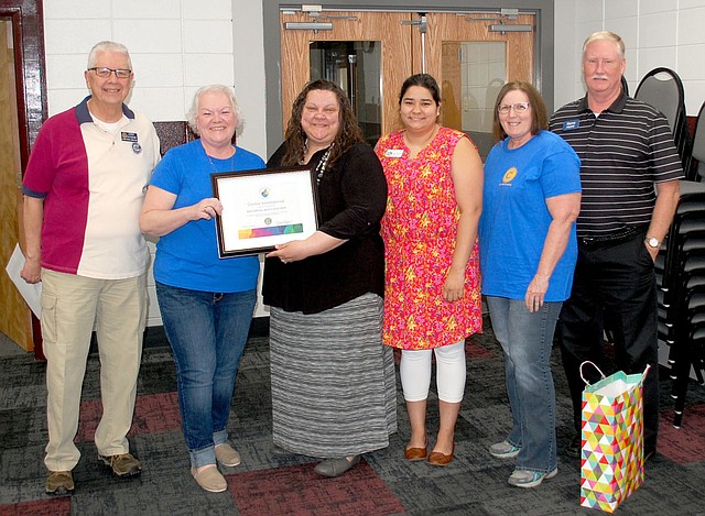 Janelle Jessen/Siloam Sunday The SIloam Springs Civitans Club presented their first annual Servant Heart Award to the special education teachers and paraprofessionals in the Siloam Springs School District during Thursday's school board meeting. The club also presented teachers and paraprofessionals with sonic gift cards. Doris Henderson, Civitan member and retired SSSD special education director, explained that April is Civitan awareness month and Civitan president Jerry Cavness read a proclamation honoring the special education teachers. Pictured, from left, are Cavness; Henderson; Shawna Ascencio-Porter, SSSD special education director; Samantha Gutierrez, assistant special education director; Civitan Dixie Shoptaw; and Civitan Steve Thomas. Civitan is an international group that supports people with disabilities and families of people with disabilities.