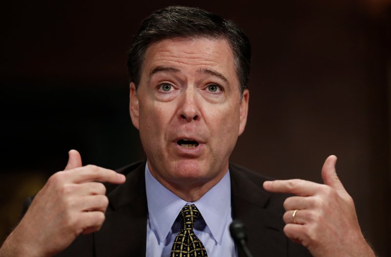 In this May 3, 2017, file photo, then-FBI Director James Comey testifies on Capitol Hill in Washington. Comey is blasting President Donald Trump as unethical and "untethered to truth" and his leadership of the country as "ego driven and about personal loyalty." Comey's comments come in a new book in which he casts Trump as a mafia boss-like figure who sought to blur the line between law enforcement and politics and tried to pressure him regarding the investigation into Russian election interference. (AP Photo/Carolyn Kaster)