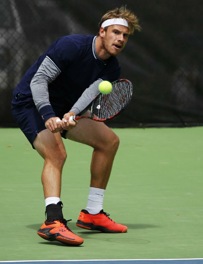 Karue Sell returns a ball during his 7-5, 6-2 victory over Nicolaas Scholtz during the championship match of the USTA Pro Futures Bolo Bash tournament Sunday at Rebsamen Tennis Center in Little Rock.