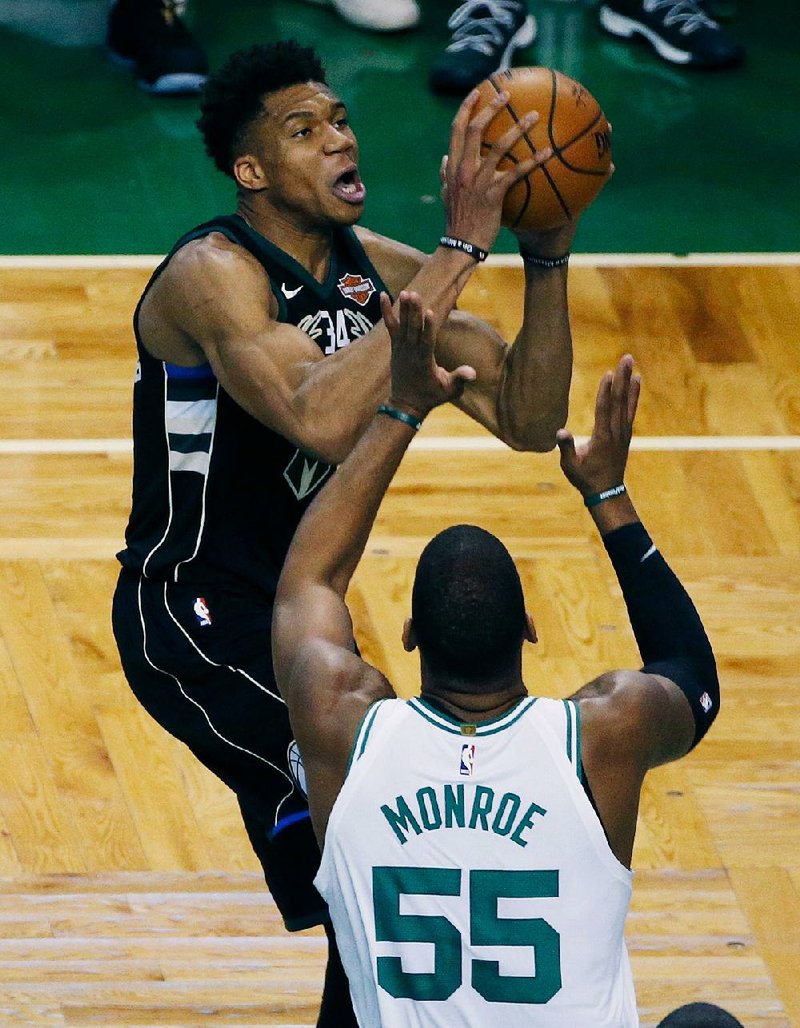 Milwaukee forward Giannis Antetokounmpo (34) scored 35 points in the Bucks’ 113-107 loss to the Boston Celtics on Sunday in Game 1 of their NBA ﬁrst-round playoff series.