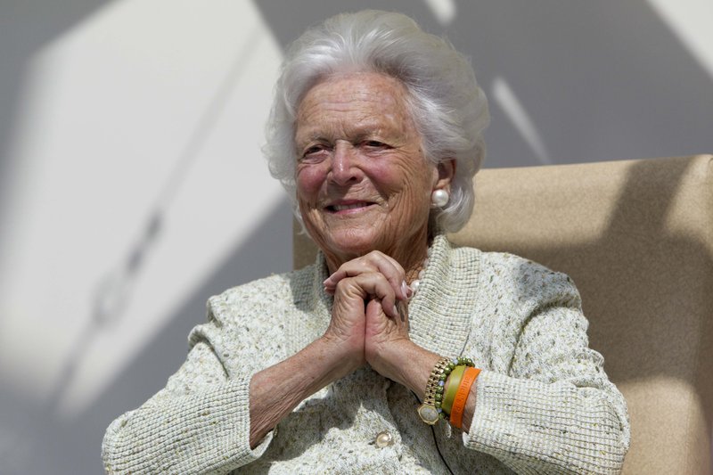 FILE - In a Thursday, Aug. 22, 2013, file photo, former first lady Barbara Bush listens to a patient's question during a visit to the Barbara Bush Children's Hospital at Maine Medical Center in Portland, Maine. (AP Photo/Robert F. Bukaty, File)