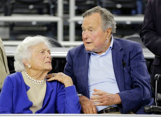 FILE - In this March 29, 2015, file photo, former President George H.W. Bush and his wife Barbara Bush, left, speak before a college basketball regional final game between Gonzaga and Duke, in the NCAA basketball tournament in Houston. A family spokesman said Sunday, April 15, 2018, that the former first lady Barbara Bush is in &quot;failing health&quot; and won't seek additional medical treatment. (AP Photo/David J. Phillip, File)