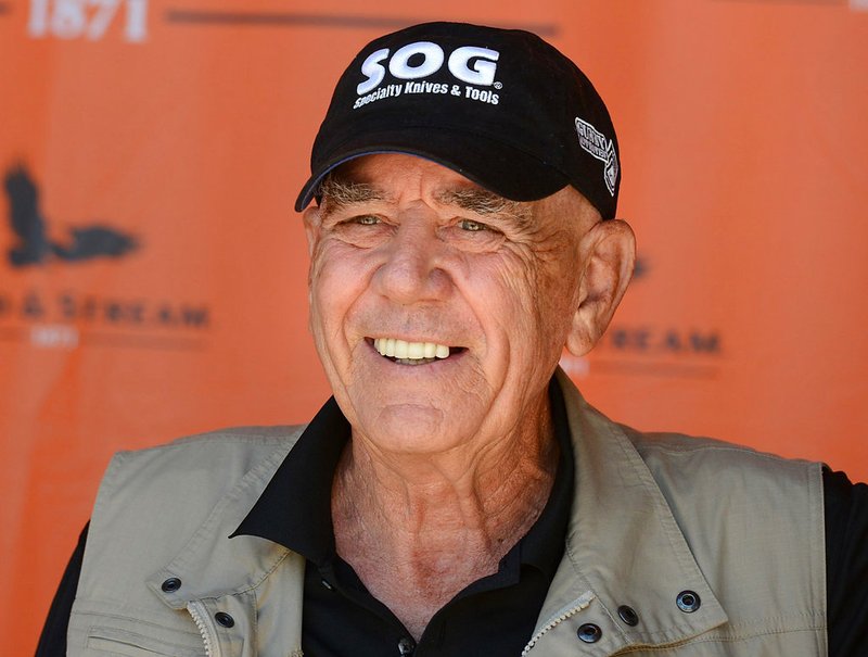 In this June 15, 2014, file photo, actor and former Marine Corps drill instructor R. Lee Ermey meets with fans during an appearance at the new Field & Stream store in Millcreek Township, west of Erie, Pa. Ermey, a former marine who made a career in Hollywood playing hard-nosed military men like Gunnery Sgt. Hartman in Stanley Kubrick's "Full Metal Jacket," has died. His longtime manager Bill Rogin says he died Sunday morning, April 15, 2018, from pneumonia-related complications. He was 74. (Jack Hanrahan/Erie Times-News via AP, File)