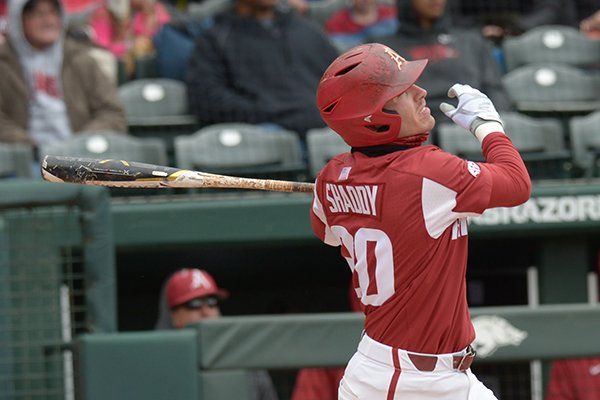 Arkansas second baseman Carson Shaddy follows through with a solo home run Saturday, April 14, 2018, during the second inning against South Carolina at Baum Stadium.