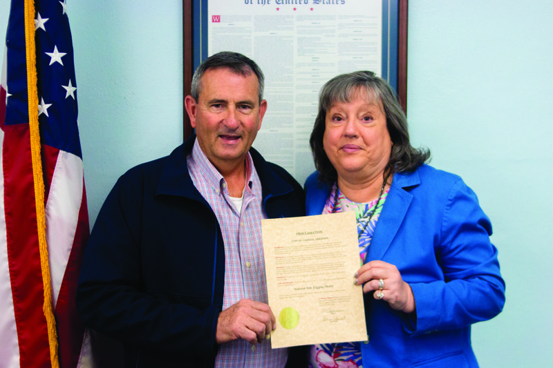 April is ‘Safe-Digging Month’
Camden Mayor Marie Trisollini, right, and Mike Cash of Centerpoint Energy Resources Manager for Camden and Magnolia, hold a proclamation designating April as “Safe Digging Month.” The proclamation is to bring awareness to the dangers of digging before learning about power lines that may be in the area. See article