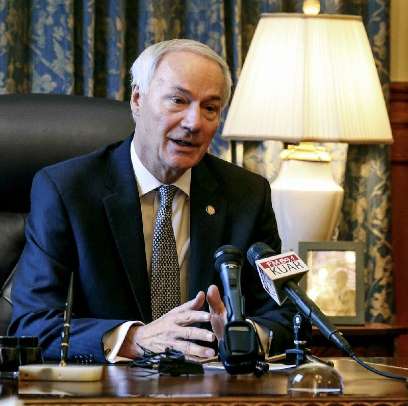 Gov. Asa Hutchinson, meeting with reporters in his office Monday morning, proposed  that  the Legislature  raise  the annual homestead property tax credit by $25, to $375. 
