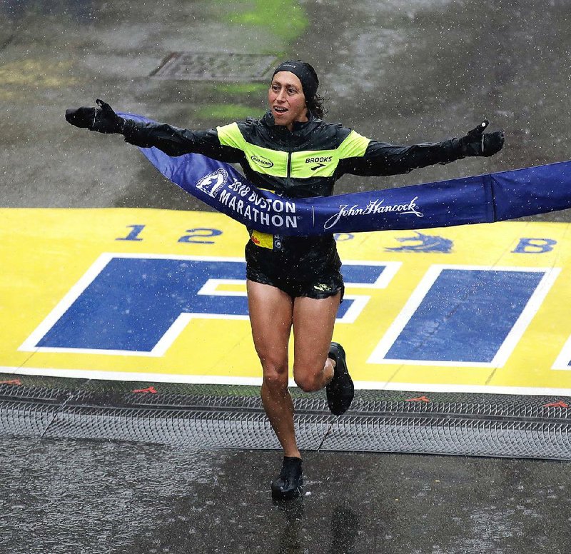 Desiree Linden, of Washington, Mich., won the women’s division of the 122nd Boston Marathon on Monday, finishing in 2 hours, 39 minutes and 54 seconds. She is the fi rst American woman to win the race since 1985.