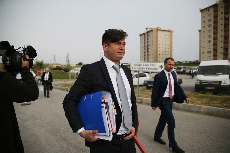 Ismail Cem Halavurt, the lawyer for Andrew Craig Brunson, who served as the pastor in Izmir, western Turkey, arrives at the prison Monday in Aliaga, Izmir province, where his client is on trial.