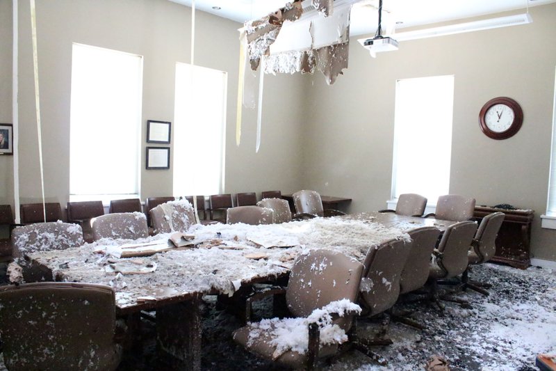 The Administration Board Room at South Arkansas Community College covered in wet insulation after the fire.