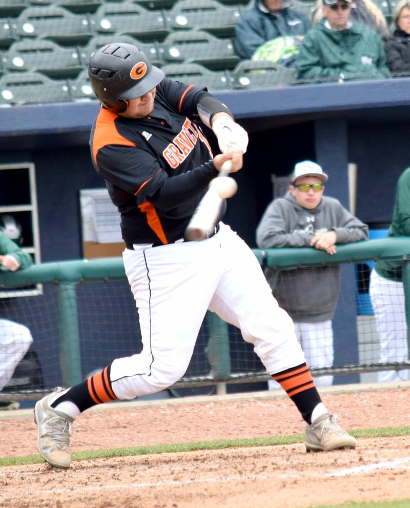 Westside Eagle Observer/MIKE ECKELS Lions' Kenton Tajchman gets a piece of the ball sending it into right field during the Gravette Lions-Mt. Vernon Mountaineers baseball game at Arvest Park in Springdale April 14.