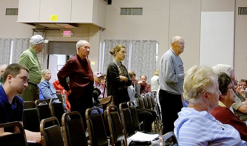 Lynn Atkins/The Weekly Vista POA members line up to speak at the open meeting to discuss the future of the valley golf courses. A hydrology study has predicted more flooding and more repairs along the creek which runs through Berksdale, Kingswood and the Country Club.