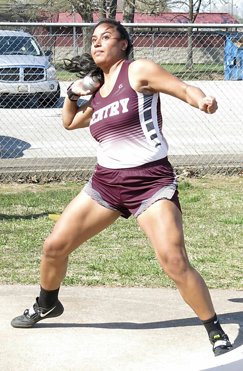 Westside Eagle Observer/RANDY MOLL Gentry senior Chastery Fuamatu throws the shot during the Pioneer Relays at Gentry High School on Thursday, April 12, 2018.