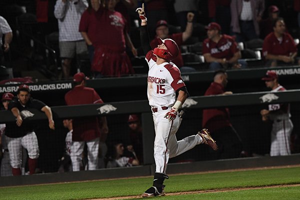 Arkansas third baseman Casey Martin runs to home plate after hitting a home run during a game against Missouri State on Tuesday, April 17, 2018, in Fayetteville. 