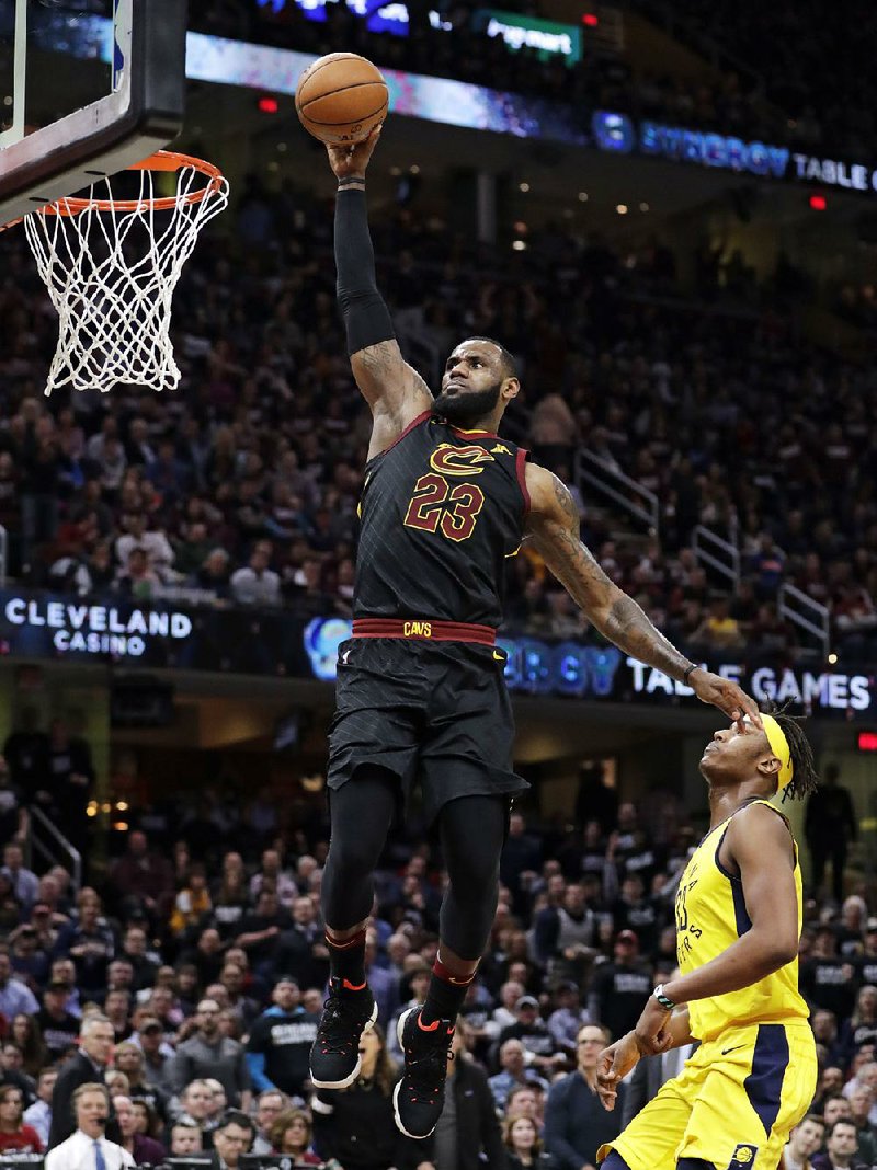 LeBron James of the Cleveland Cavaliers flies to the basket for a dunk during the Cavaliers’ victory over the Indiana Pacers in Game 2 of their NBA playoff series Wednesday night in Cleveland.  