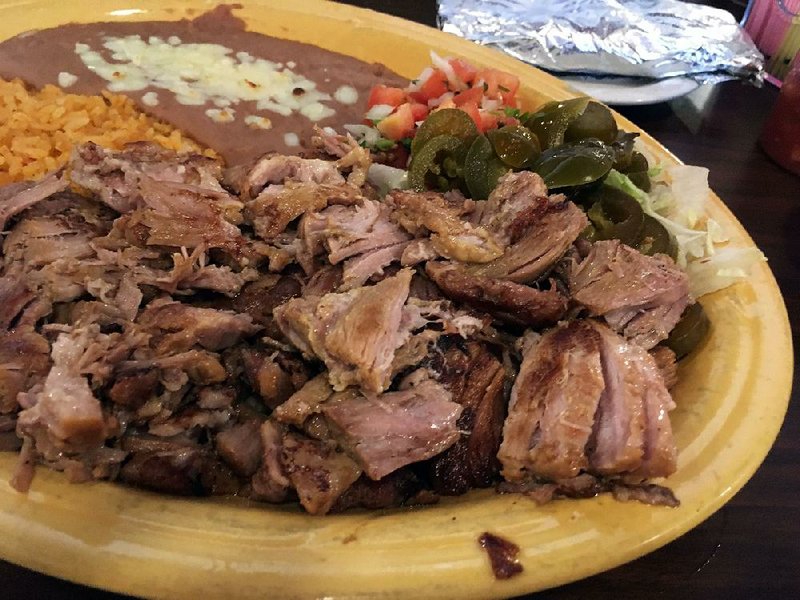 The Carnitas at Cantina Cinco de Mayo are tender, lean and come in a huge portion with rice and refried beans. 