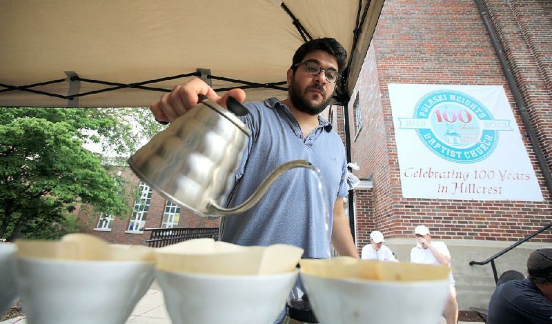 Mylo Coffee Co. won’t be expanding or creating a new restaurant/entertainment space in the former Afterthought on Kavanaugh Boulevard in Little Rock. Owner Stephanos Mylonas (shown making coffee at the Hillcrest Farmers Market in 2013) issued a statement last week indicating he was giving up the project, hinting that it was no longer feasible fi nancially, and putting it up for potential buyers.  