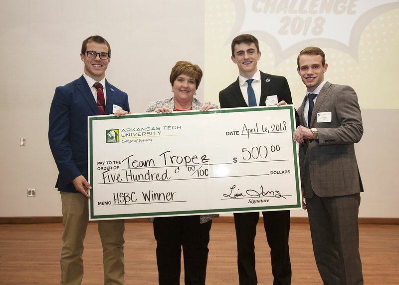 Courtesy photo A team from Farmington High School was the overall winner of the High School Business Challenge sponsored by Arkansas Tech University in Russellville. Team members (boys, from left) Caleb Williams, Coleman Warren and Tanner Green captured the $500 first prize. Cameron Waterman of Clarksville won a $500 book scholarship in recognition of her entrepreneurial spirit and presentation skills. The annual contest asks high school students to develop a marketable idea, create a business plan and then present the concept to a panel of judges. Criteria includes the quality of the business, organization and structure, marketing, profitability, resources and professionalism. Teams from Bentonville High School and Clarksville High School were among the finalists.