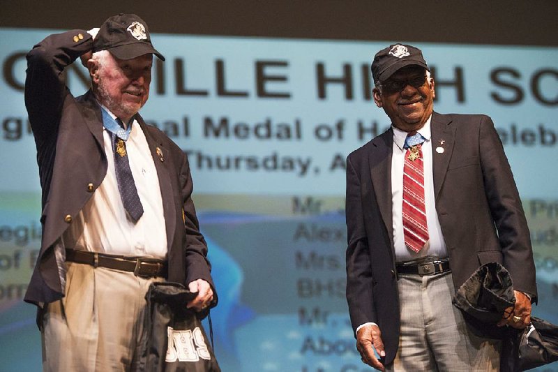 Medal of Honor recipients Bruce P. Crandall (left) and Melvin Morris were among veterans speaking Thursday to students at Bentonville High School and the University of Arkansas, Fayetteville.