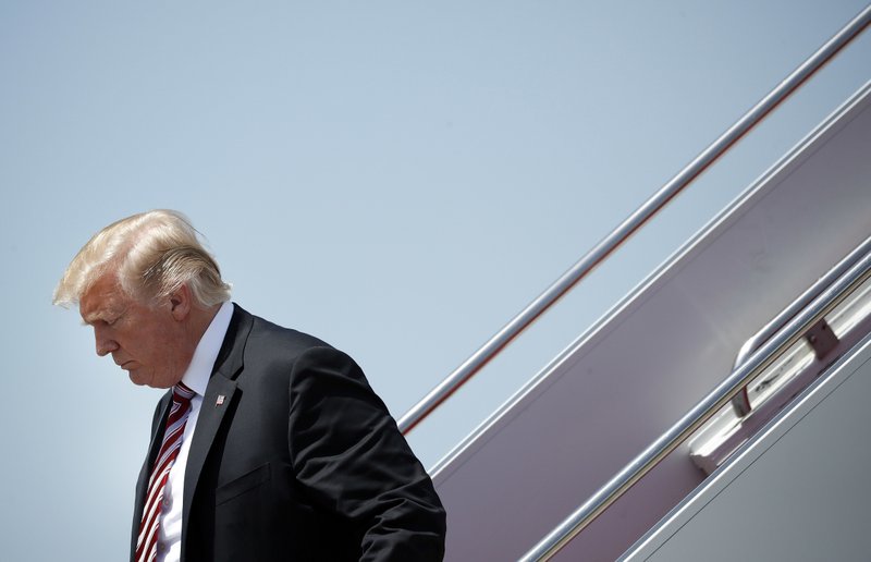 President Donald Trump walks down the stairs of Air Force One during his arrival at Palm Beach International Airport in West Palm Beach, Fla., Thursday, April 19, 2018. (AP Photo/Pablo Martinez Monsivais)