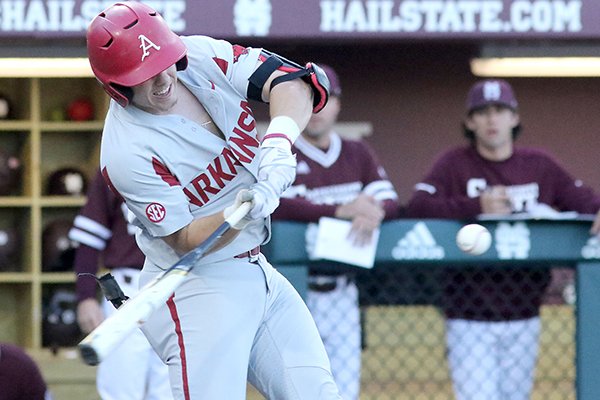 Eric Cole prepares to hit a grand slam home run during the second inning of their NCAA college baseball game against Mississippi State in Starkville, Miss., Friday, April 20, 2018. 