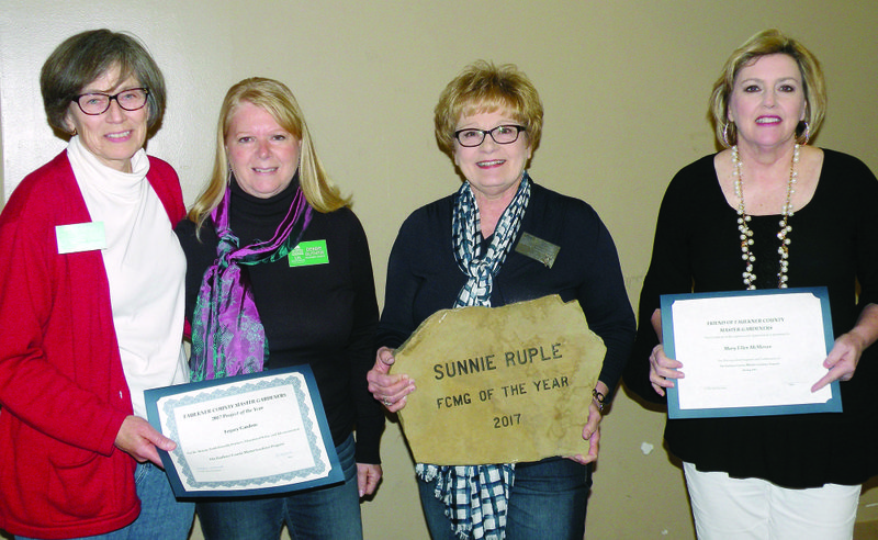 Receiving awards from the Faulkner County Master Gardeners are, from left, Cherry Childs and Debbie Guthrie, co-chairwomen of the Legacy Gardens Project, which was named the 2017 Project of the Year; Sunnie Ruple, who was named Faulkner County Master Gardener of the Year for 2017; and Mary Ellen McMoran, who, along with Travis Sellers, each received a Friend of Faulkner County Master Gardeners certificate.