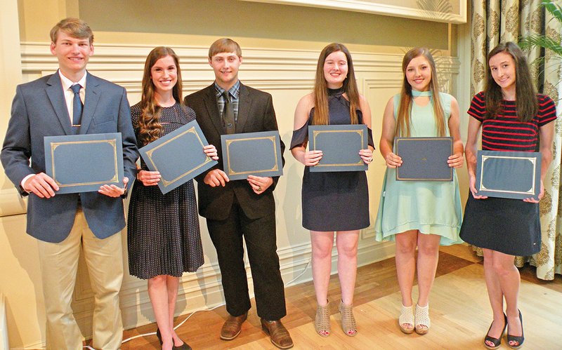 Receiving scholarships at the 4.0 GPA Student Recognition and Scholarship Luncheon sponsored by Altrusa International of Hot Springs Village on March 28 are, from left, Noah Eskew, Chloe Davis and Johnathan Bates, all of Jessieville High School; Kelly Currington and Ali Meeks, both of Mountain Pine High School; and Madison Dixon of Cutter Morning Star High School.