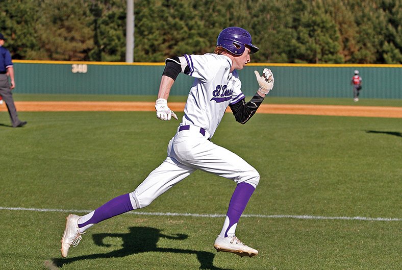 Terrance Armstard/News-Times El Dorado's Leighton Turbeville heads for home against Hope. Turbeville scored from second base on a ground out in the Wildcats' 11-1 win Friday at the El Dorado/Union County Recreation Complex.