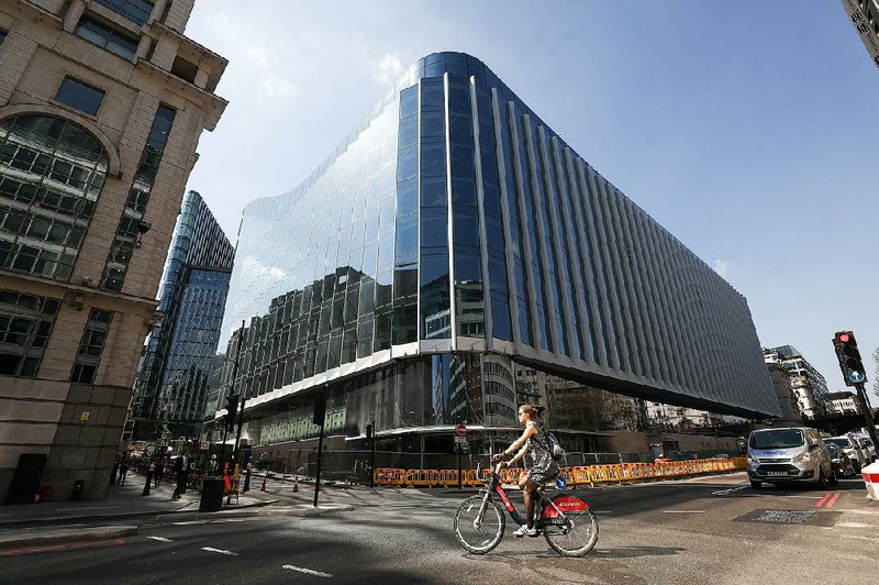 The European headquarters of Goldman Sachs in London is pictured. Goldman Sachs was among six major Wall Street banks that saved as a result of the recent tax cut, with Goldman paying 17.2 percent in taxes in the first quarter. 