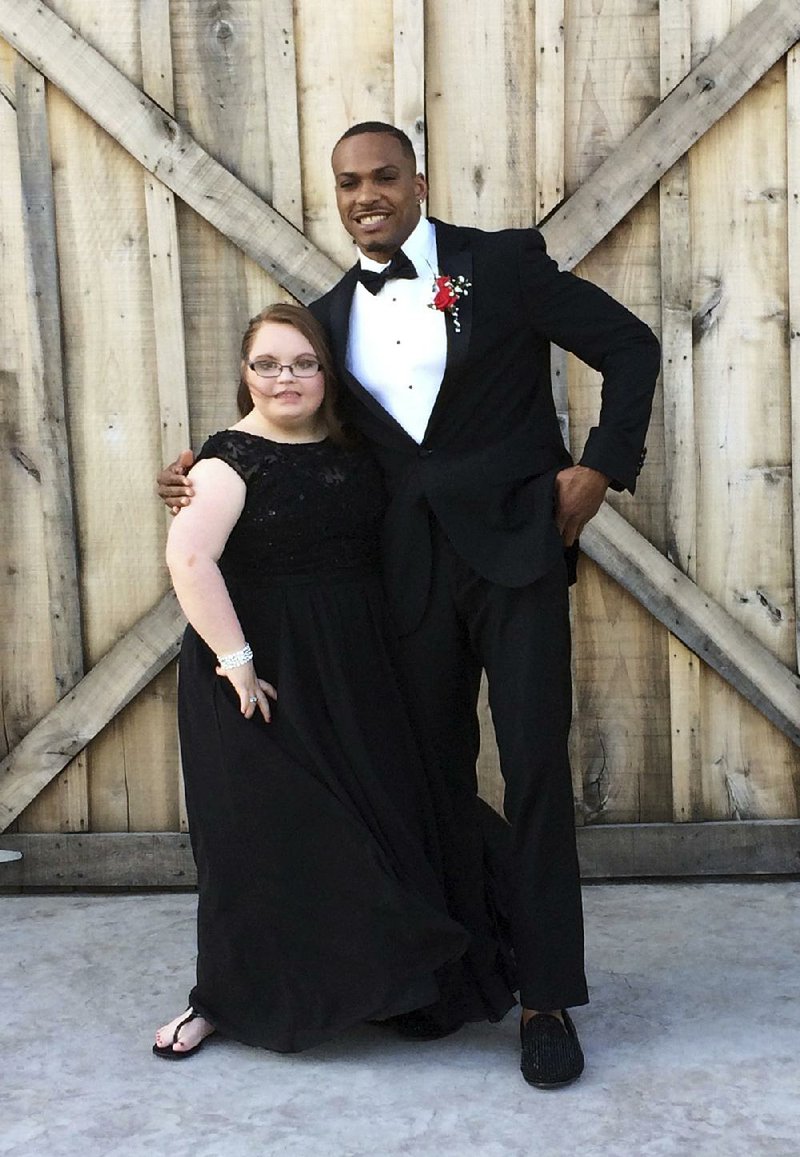 Former Arkansas State University football player and current San Francisco 49er Don Jones escorted special-needs student Lindsey Preston to her prom April 13 in Moulton, Ala. 
