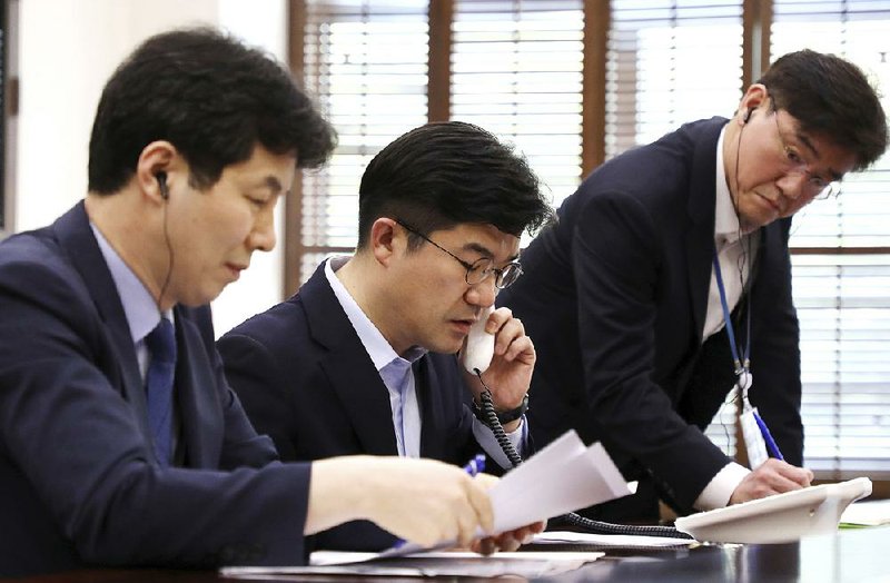 A South Korean presidential official on Friday tests a new hotline installed between Seoul’s presidential Blue House and North Korea’s State Affairs Commission in Pyongyang. The hotline will help ease dialogue and reduce misunderstandings during times of tensions, officials said. 
