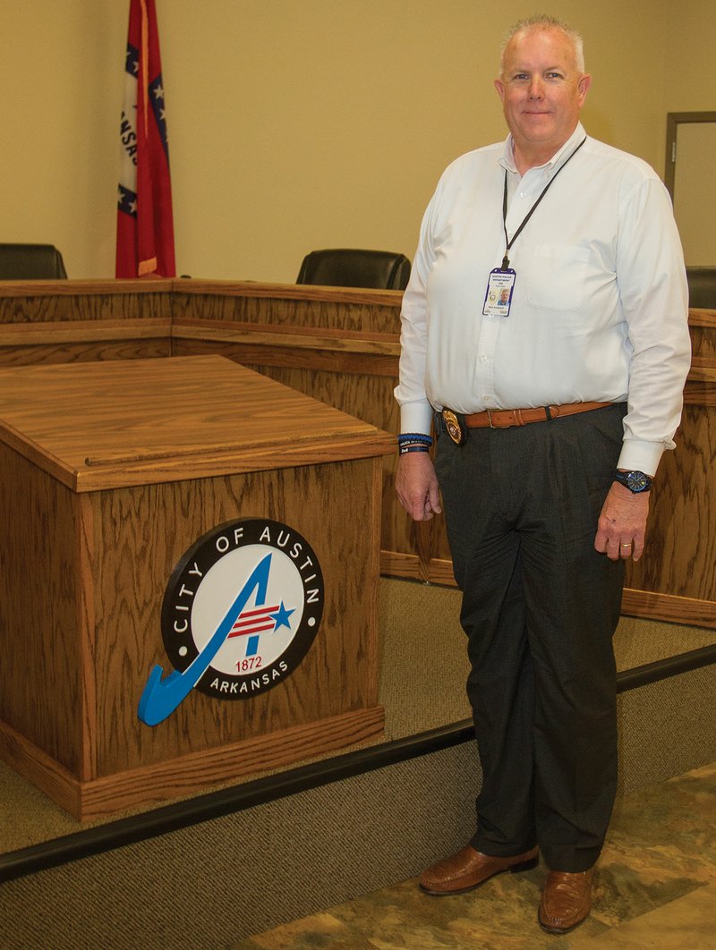 New Austin Police Chief Rick Anderson stands in the municipal courtroom at Austin City Hall. Anderson started the job March 29. He has 30 years of law enforcement experience, working 25 years for the Pulaski County Sheriff’s Office and five years with the Little Rock Police Department.