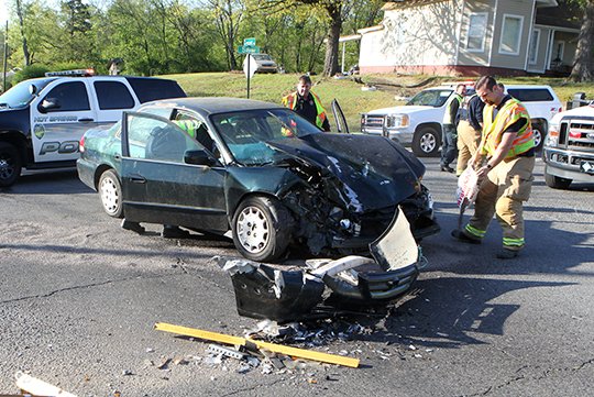 Car, bus collide, causing power outage, injuries