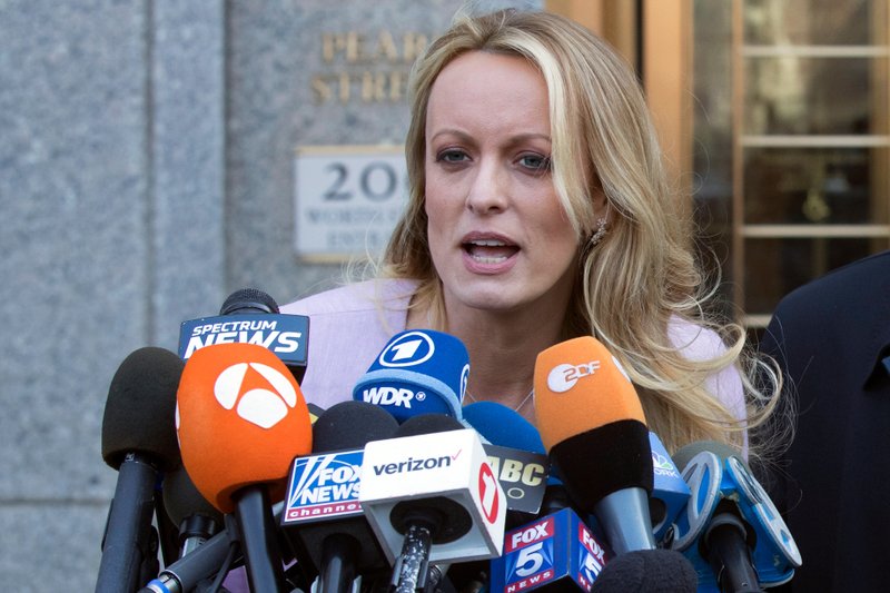 FILE - In this April 16, 2018, file photo, adult film actress Stormy Daniels speaks outside federal court in New York. (AP Photo/Mary Altaffer, file)