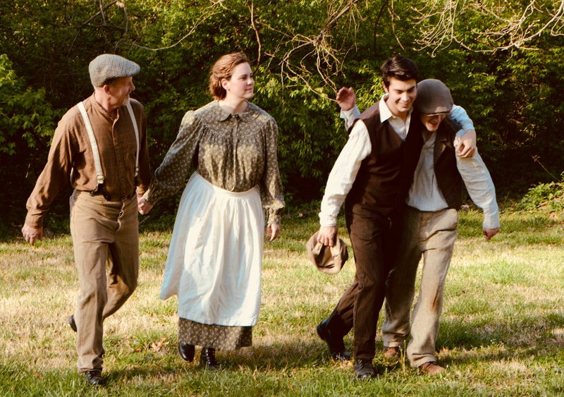 Photo courtesy Jackie Jasper Photography The Tucks -- Angus (Kurt Marine), Mae (Shiloh Jones), Miles (Michael Myers) and Jesse (Braeden Barlow) -- enjoy a moment of family time before the storm in Pilot Arts' production of "Tuck Everlasting." Video accompanies the story at nwaonline.com/features/whatsup.