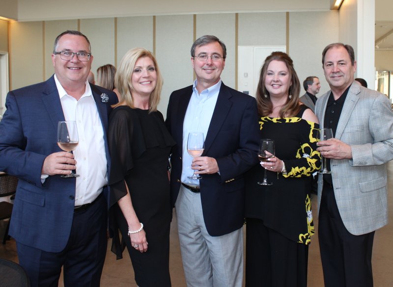 Brian and Tammy Chase (from left), Jeff Palmer and Janet and Frank Seaton help support Bost Inc. at the Northwest Arkansas Chef and Winemaker Dinner on April 12 at 21c Museum Hotel in Bentonville.