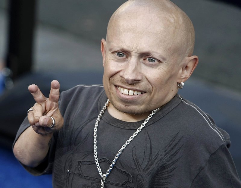 FILE- In this June 11, 2008 file photo, actor Verne Troyer poses on the press line at the premiere of the feature film "The Love Guru" in Los Angeles. Troyer from the "Austin Powers" movie franchise has died. A statement provided by Troyer's representatives that was also posted to his Instagram and Facebook accounts says the 49-year-old actor died Saturday, April 21, 2018. No cause or place of death was given, but the statement discusses depression and suicide, and Troyer had publicly discussed struggling with alcohol addiction. He lived in Los Angeles. (AP Photo/Dan Steinberg, file)