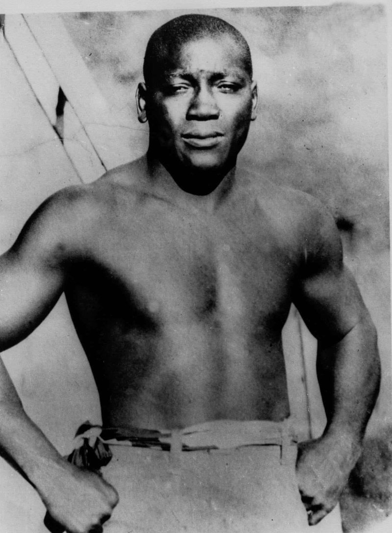 FILE - This undated photo shows boxer Jack Johnson. President Donald Trump says he's considering"a Full Pardon!" for boxing's first black heavyweight champion more than 100 years after Jack Johnson was convicted by all-white jury of "immorality" for one of his relationships. Trump tweets that the actor Sylvester Stallone called him to share Johnson's story. Trump says Johnson's "trials and tribulations were great, his life complex and controversial." The president adds: "Others have looked at this over the years, most thought it would be done, but yes, I am considering a Full Pardon!" (AP Photo/File