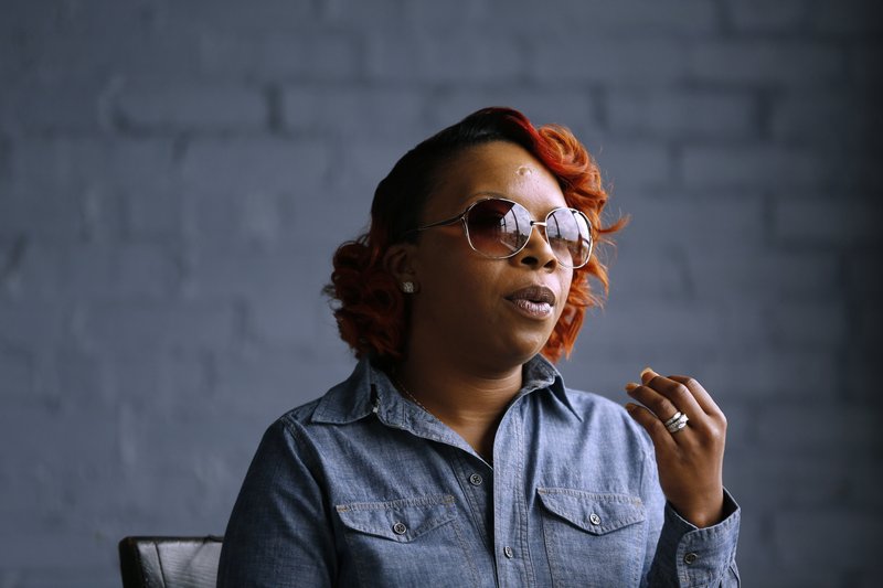 In this April 27, 2016, file photo Lezley McSpadden, mother of Michael Brown, speaks during an interview in St. Louis. Brown was an unarmed, black 18-year-old when he was fatally shot by a white police officer in Ferguson, Mo. The officer was not charged. Brown's death touched off widespread protests and a national discussion about race relations and police. McSpadden is to be at Harvard University, Monday, April 23, 2018 for a panel titled "The Movement for Black Lives: Justice for Michael Brown 4 Years Later." (AP Photo/Jeff Roberson, File)
