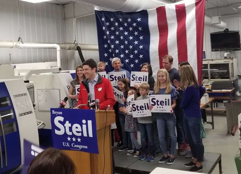 Attorney Bryan Steil, a former driver for House Speaker Paul Ryan, announces he is running to succeed Ryan in Congress, Sunday, April 22, 2018, in Janesville, Wis. (Jake Magee/The Janesville Gazette via AP)