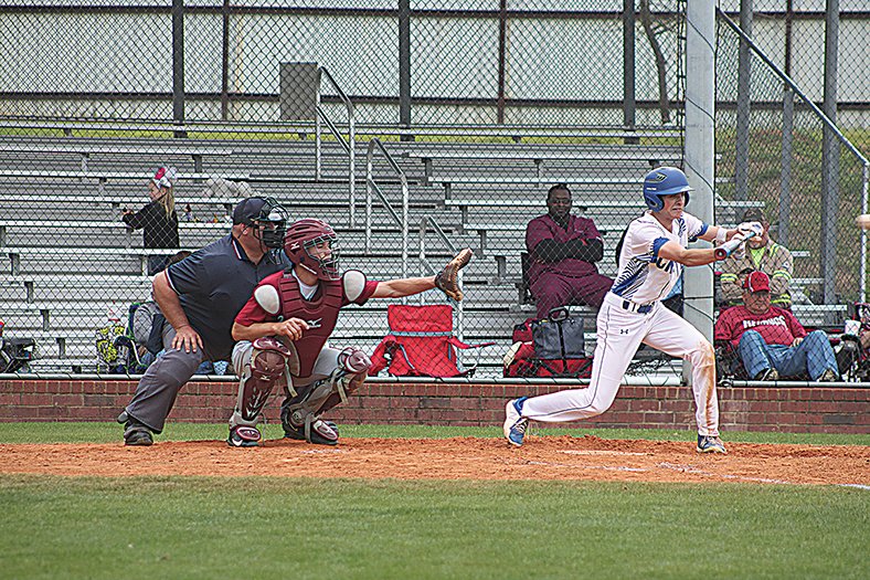Ryan Brown/Special to the News-Times Parkers Chapel's Michael Brotherton attempts to lay down a bunt against Fordyce. The Trojans beat the Redbugs 4-1 Monday at Parkers Chapel.