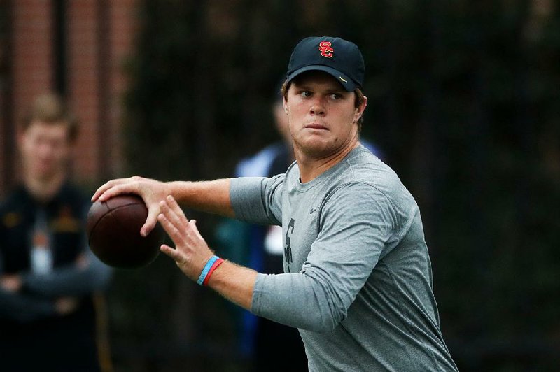 In this March 21, 2018 photo Southern California quarterback Sam Darnold throws a pass during USC Pro Day in Los Angeles. Darnold is a top prospect in the upcoming NFL draft. (AP Photo/Jae C. Hong)