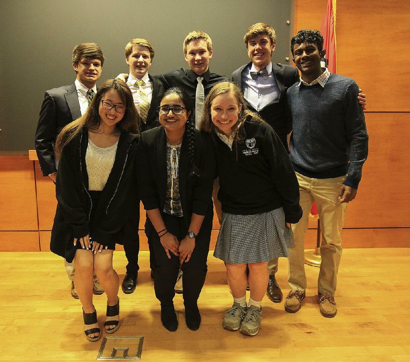 Student winners of the Stephens Awards are (back row, left to right) Harrison Scott Brown, Spencer Davis, Joshua David Bucher, Nicholas Powell and Anil Chakka and (front row, left to right) Jua Jung, Sarah Tariq and Mary Kathryn Strickland. The awards are provided by The City Education Trust formed by Jackson T. Stephens and W.R. “Witt” Stephens in 1985. 
