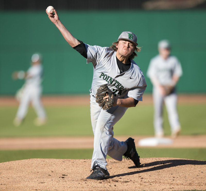 Van Buren’s Trevor Johnson throws a pitch during a baseball game Monday at Arvest Ballpark in Springdale.