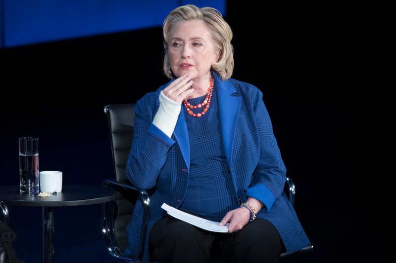 FILE - In this April 13, 2018 file photo, Hillary Clinton speaks during the ninth annual Women in the World Summit in New York. Clinton says press rights and free speech are &#x201c;under open assault&#x201d; under Donald Trump, and has likened his administration to an authoritarian regime. In a lecture on freedom of speech Sunday, April 22, the former secretary of state minced no words as she decried what she called &#x201c;an all-out war on truth, facts and reason.&#x201d; (AP Photo/Mary Altaffer, File)