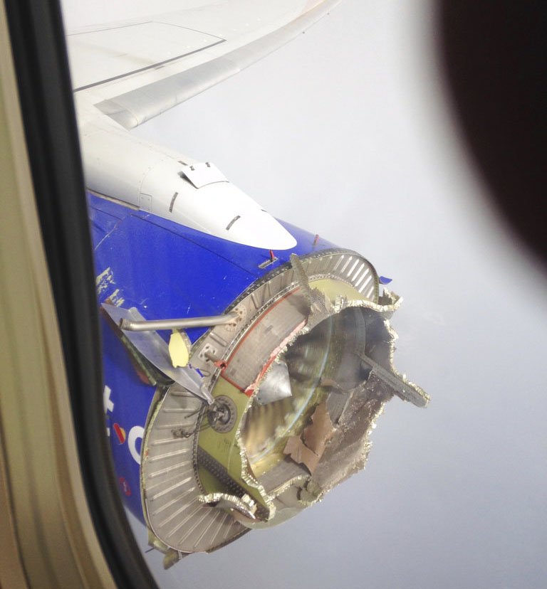 This Aug. 27, 2016, file photo shows an engine through a window of a Southwest Airlines flight. The flight from New Orleans bound for Orlando, Fla., diverted to Pensacola, Fla., after the pilot detected something had gone wrong with the engine. Over the years, the Dallas-based carrier has paid millions of dollars to settle safety violations, including multiple fines for flying planes that didn’t have required repairs. In 2016, the engine on the Southwest jet blew apart over Florida, hurling debris that struck the fuselage and tail. The pilots landed the plane safely, and no one was hurt. (Jeremy Martin via AP, File)
