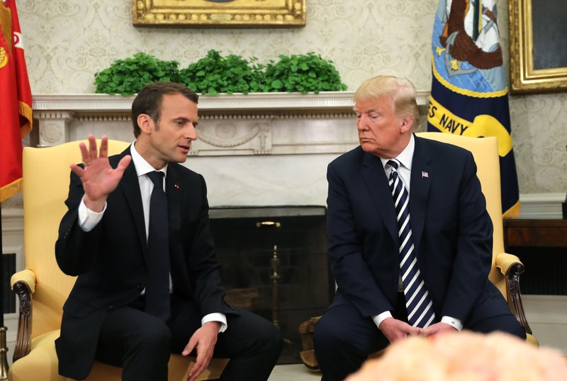 French President Emmanuel Macron talks at the beginning of his meeting with President Donald Trump in Oval Office of the White House in Washington, Tuesday, April 24, 2018. (AP Photo/Pablo Martinez Monsivais)

