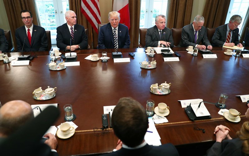 President Donald Trump and French President Emmanuel Macron during their meeting in the Cabinet Room of the White House in Washington, Tuesday, April 24, 2018. (AP Photo/Pablo Martinez Monsivais)