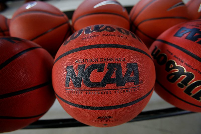 In this March 22, 2010, file photo, basketballs are seen before Northern Iowa's NCAA college basketball practice, in Cedar Falls, Iowa. College basketball spent an entire season operating amid a federal corruption investigation that magnified long-simmering problems within the sport, from unethical agent conduct to concerns over the "one-and-done" model. Now it’s time to hear new ideas on how to fix them. On Wednesday morning, April 25, 2018, the commission headed by former Secretary of State Condoleezza Rice will present its proposed reforms to university presidents of the NCAA Board of Governors and the Division I Board of Directors at the NCAA headquarters in Indianapolis. And that starts what could be a complicated process in getting changes adopted and implemented in time for next season. (AP Photo/Charlie Neibergall, File)